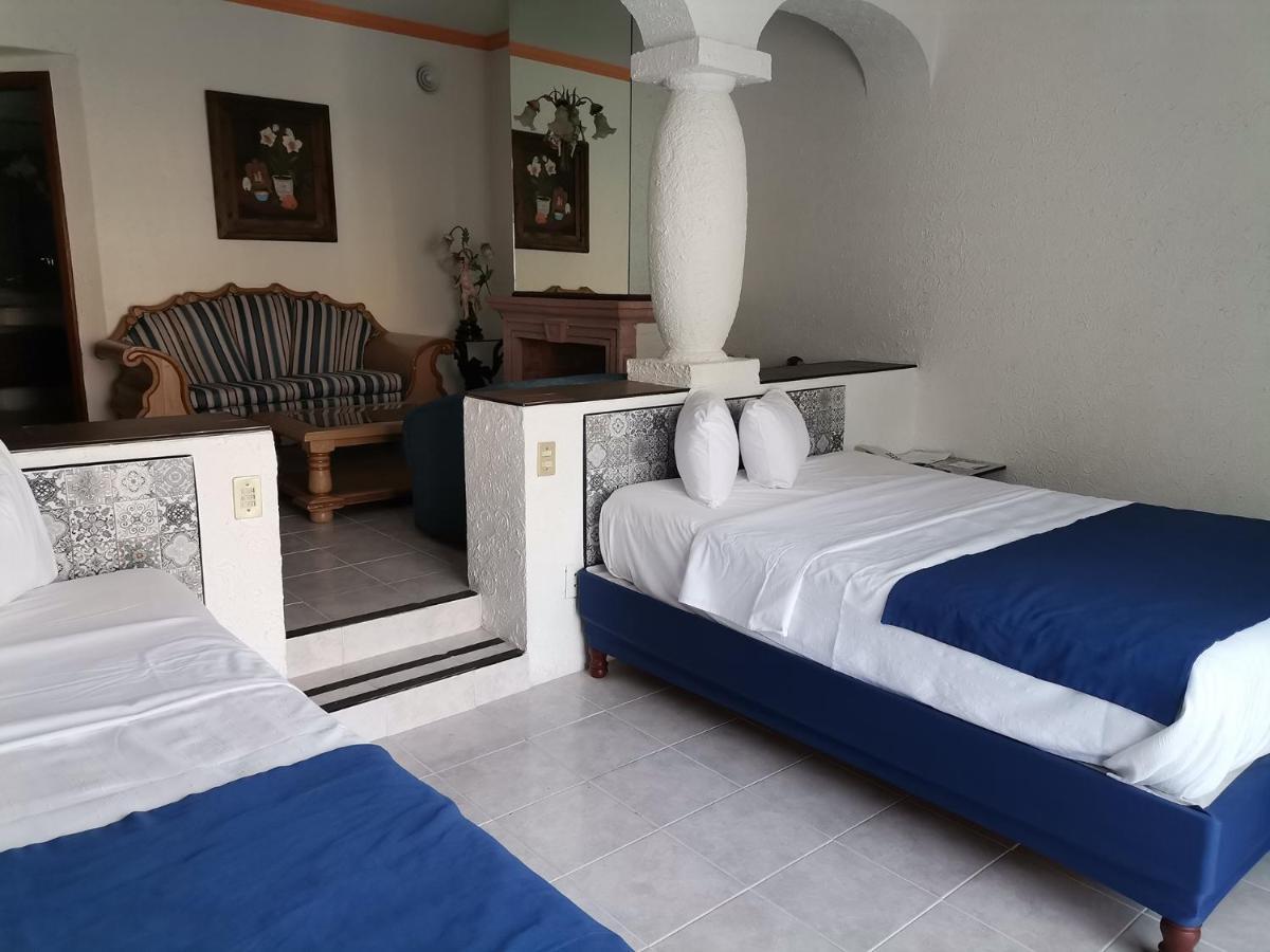哈深达德拉诺里亚大酒店 阿瓜斯卡达特斯 外观 照片 A room at the hotel