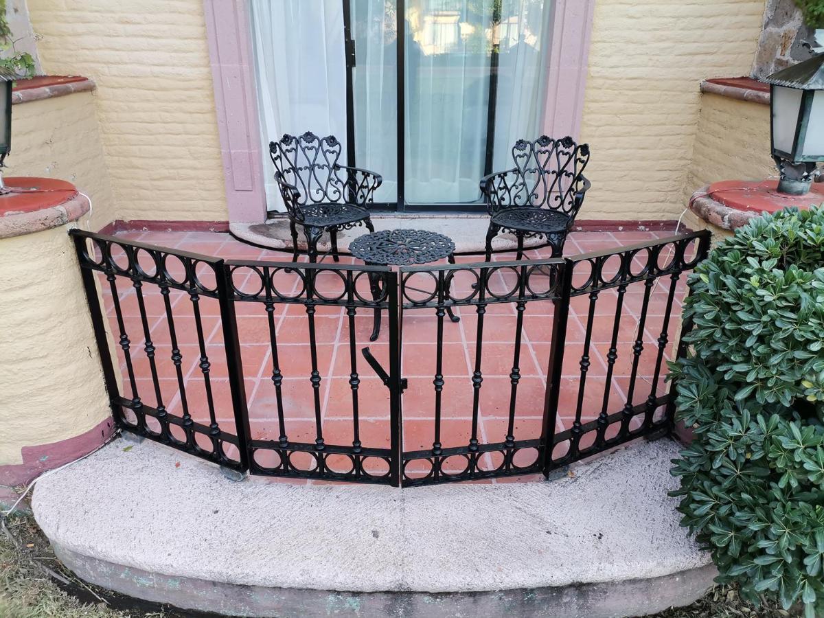 哈深达德拉诺里亚大酒店 阿瓜斯卡达特斯 外观 照片 A wrought iron balcony