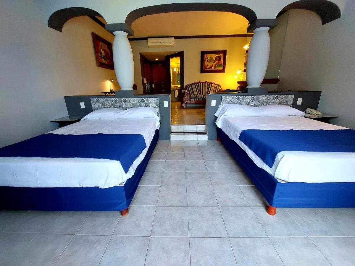 哈深达德拉诺里亚大酒店 阿瓜斯卡达特斯 外观 照片 A room at the hotel