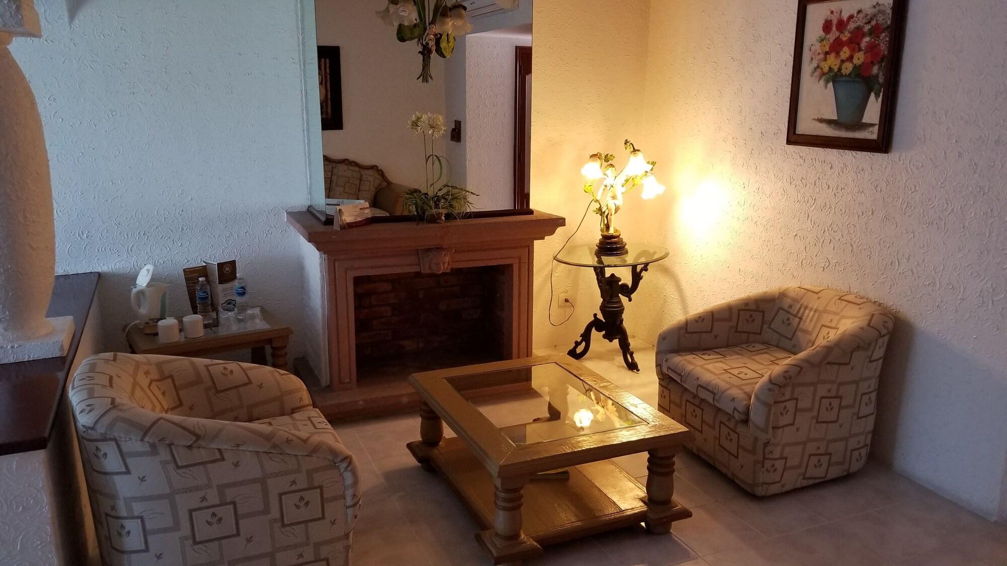 哈深达德拉诺里亚大酒店 阿瓜斯卡达特斯 外观 照片 A living room in a typical hotel