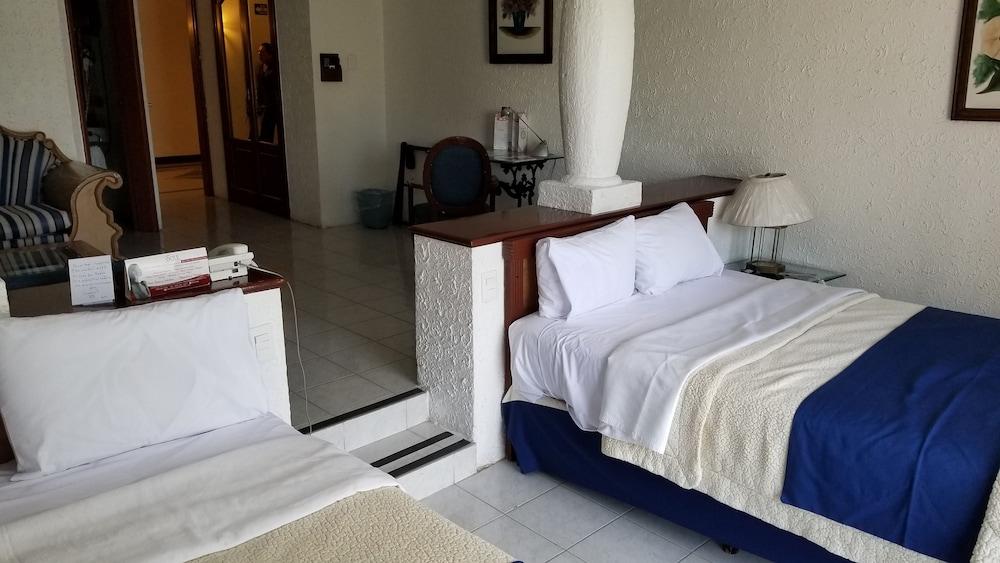 哈深达德拉诺里亚大酒店 阿瓜斯卡达特斯 外观 照片 A room at the hotel